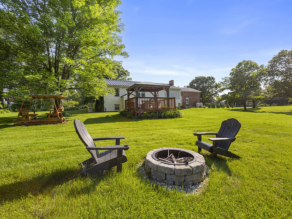 176 Garland Road Winslow, ME 04901 - Photo 5 of 25 Back yard fire pit