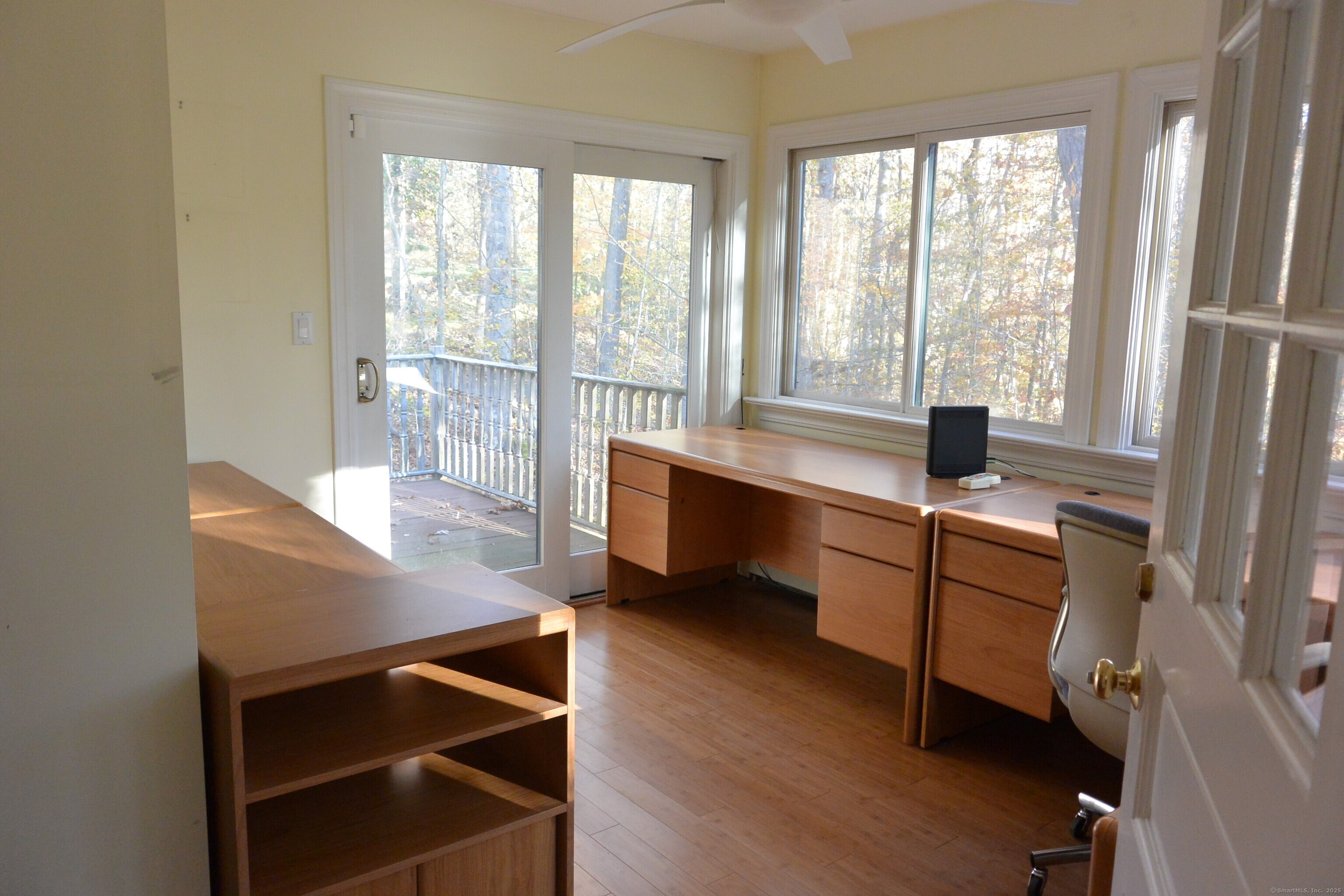 439 Cheese Spring Road New Canaan, CT 06840 - Photo 11 of 36 a room with wooden floor and furniture