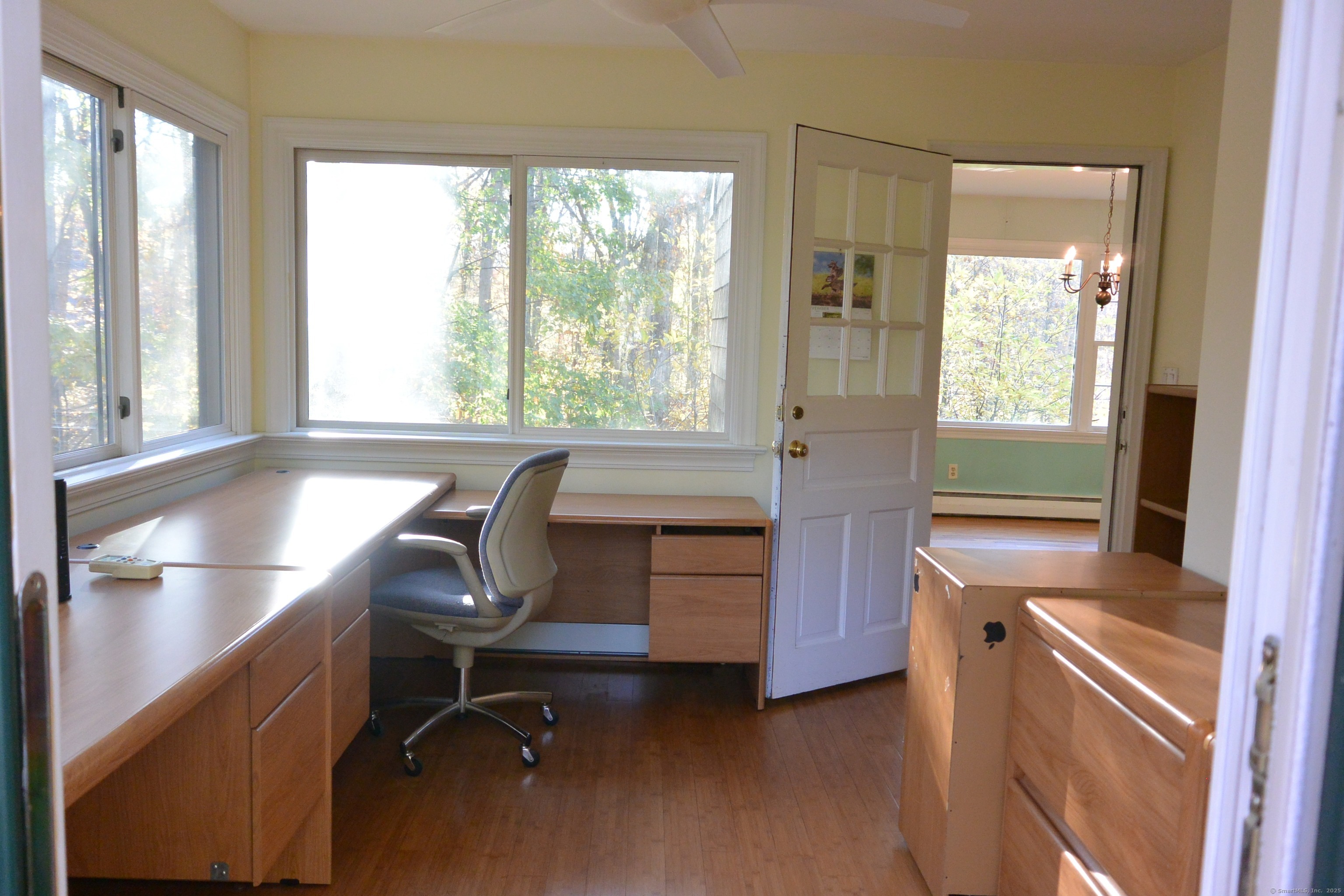 439 Cheese Spring Road New Canaan, CT 06840 - Photo 12 of 36 a room with a window and a kitchen view