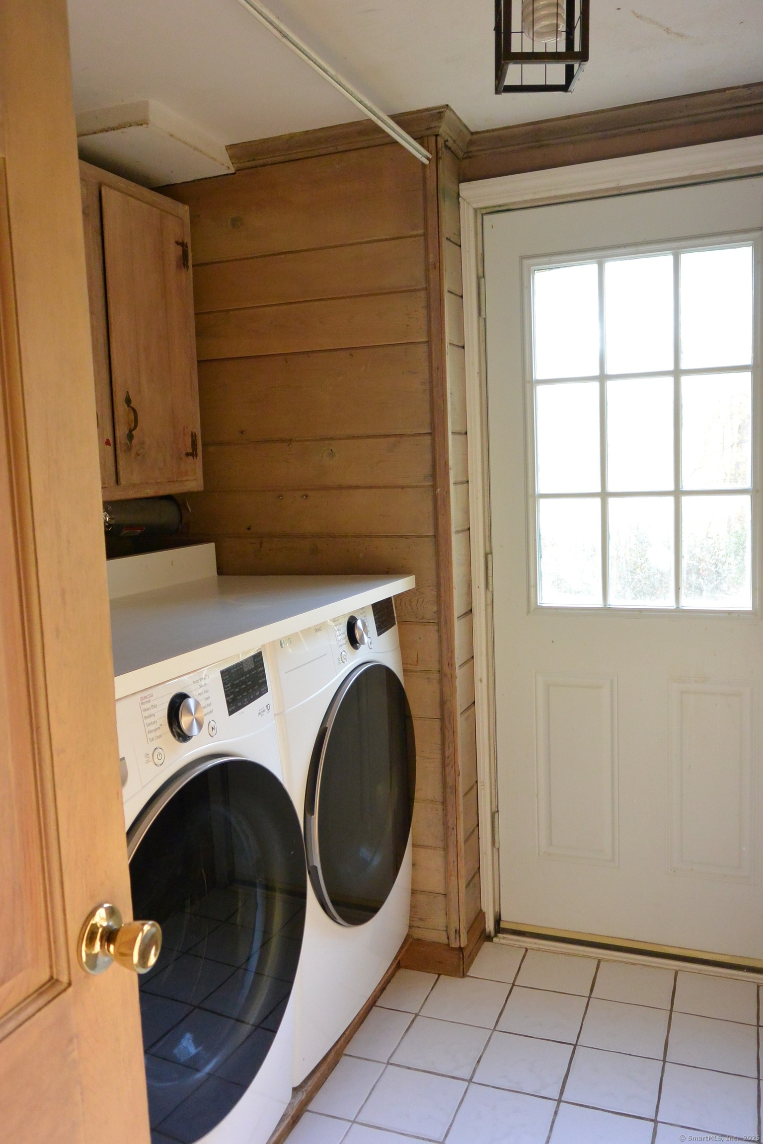439 Cheese Spring Road New Canaan, CT 06840 - Photo 25 of 36 a utility room with dryer and washer