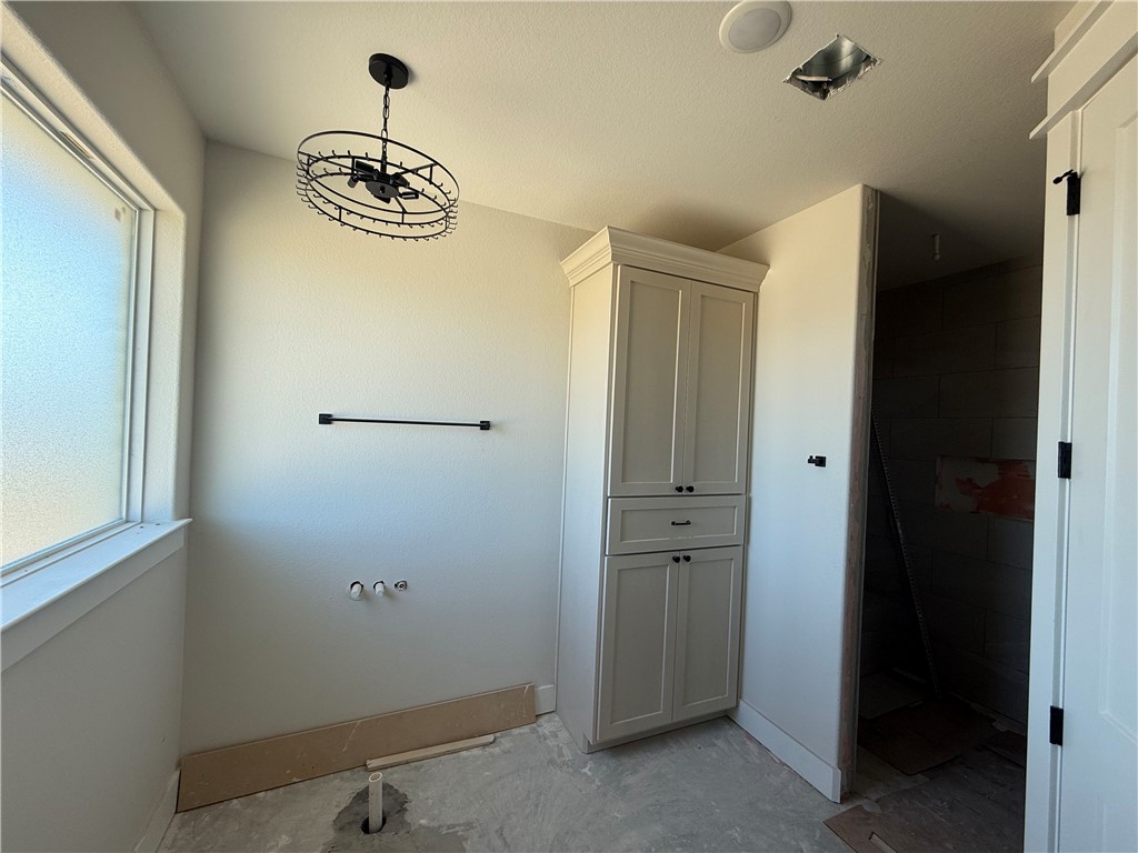 7822 Mathis Crk Drive Bryan, TX 77808 - Photo 11 of 20 a view of a hallway with a elevator