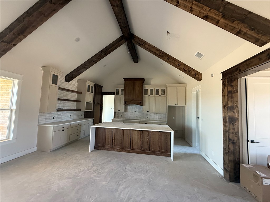 7822 Mathis Crk Drive Bryan, TX 77808 - Photo 6 of 20 a large white kitchen with a stove and a refrigerator