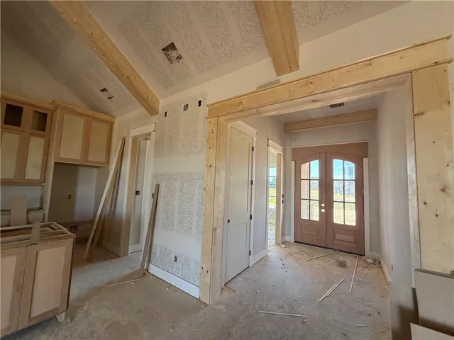 a view of a hallway with natural light