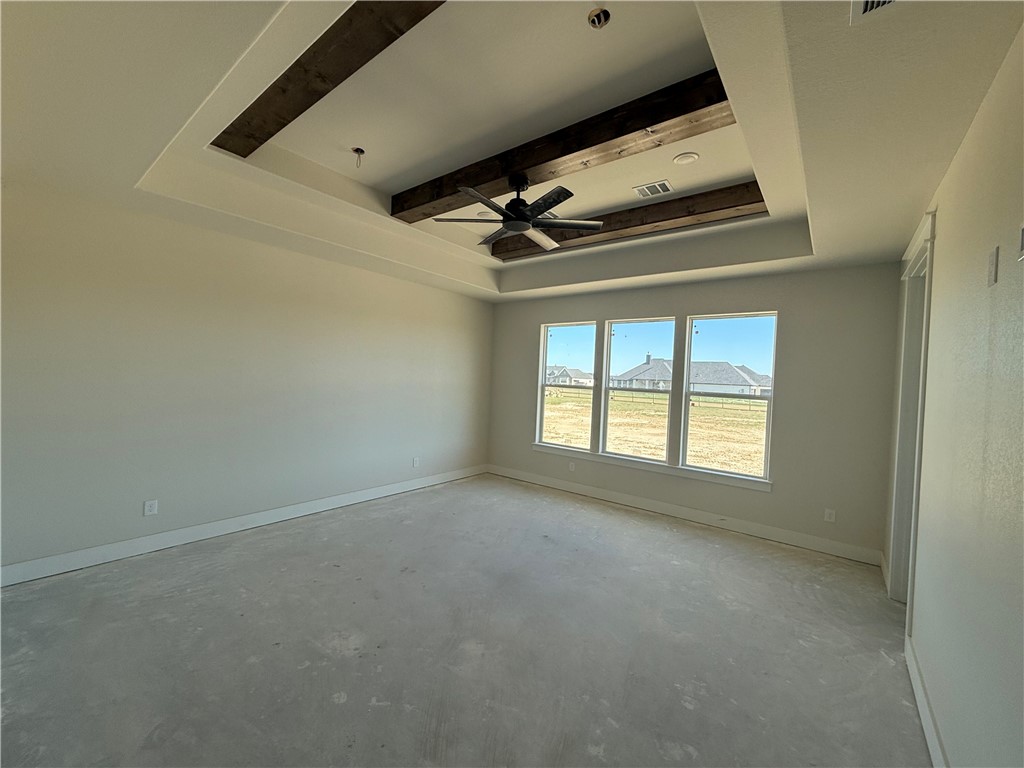 7822 Mathis Crk Drive Bryan, TX 77808 - Photo 9 of 20 a view of room with a ceiling fan and window