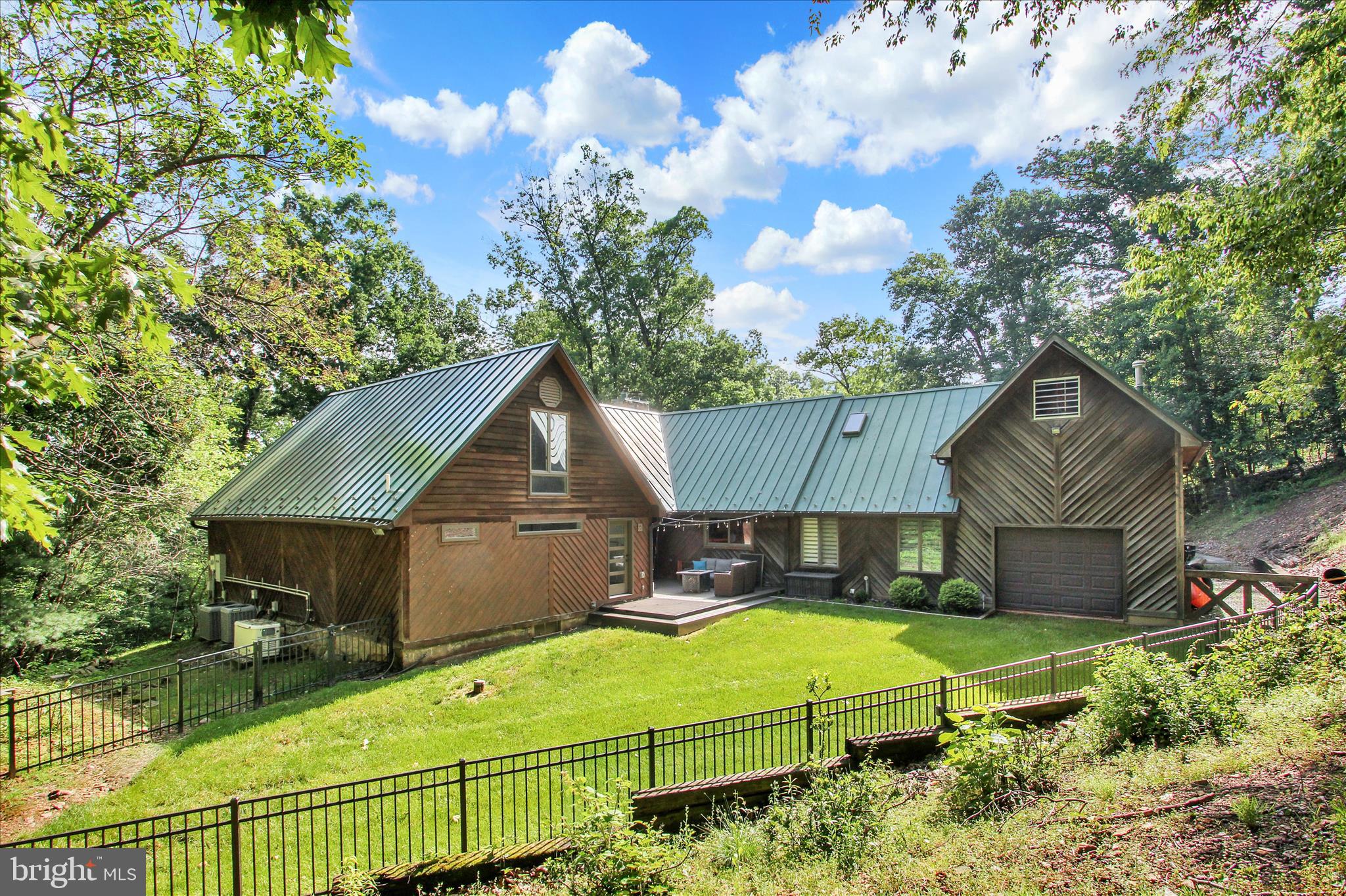 1855 Westwood Road York, PA 17403 - Photo 46 of 60 a view of a house with a backyard and a tree