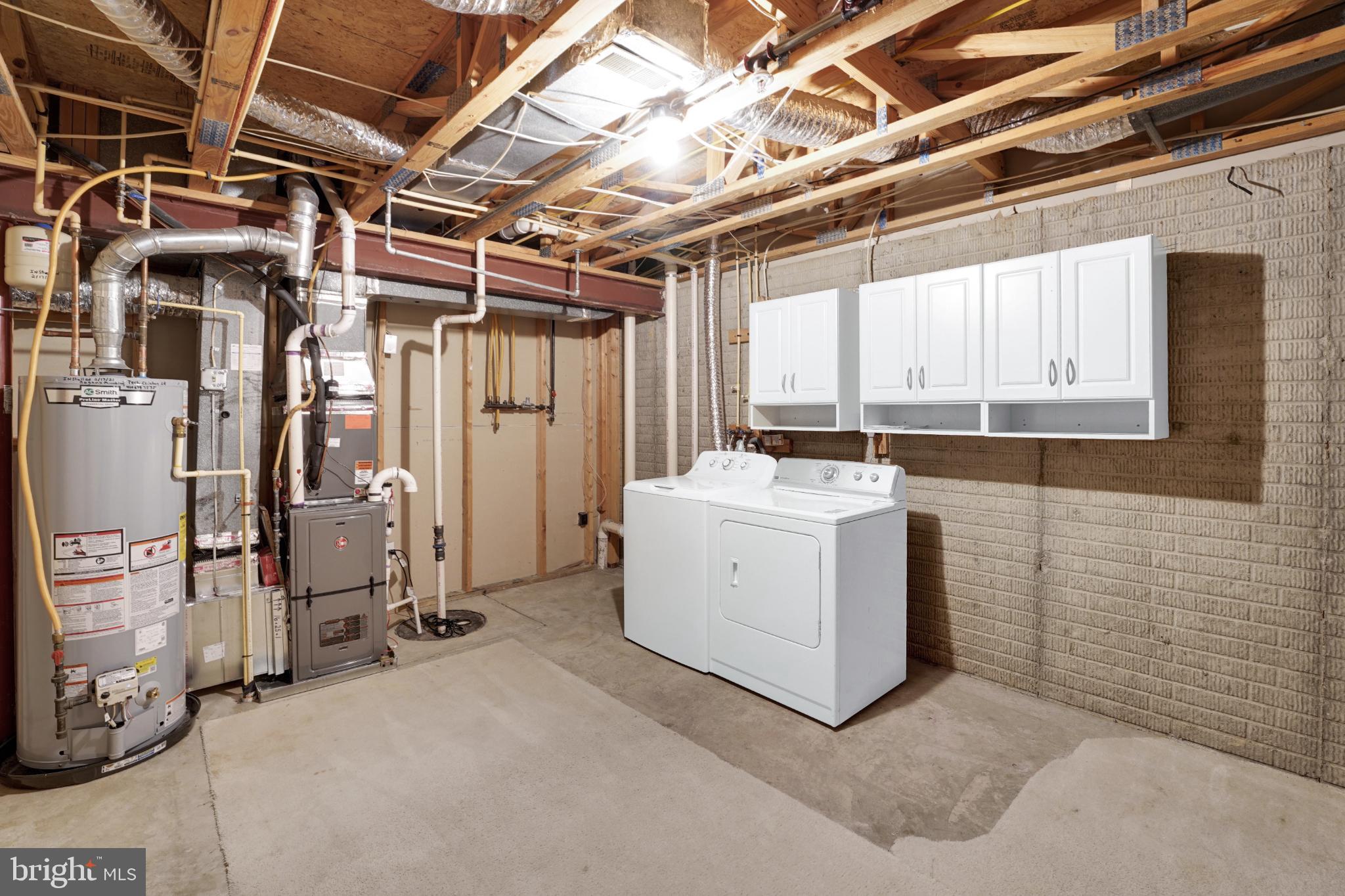 265 Cherry Tree Square Forest Hill, MD 21050 - Photo 26 of 29 Functional basement laundry area with storage.