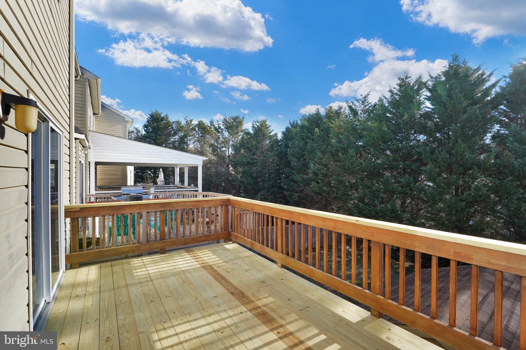 265 Cherry Tree Square Forest Hill, MD 21050 - Photo 27 of 29 Sunny deck off kitchen with serene tree views.
