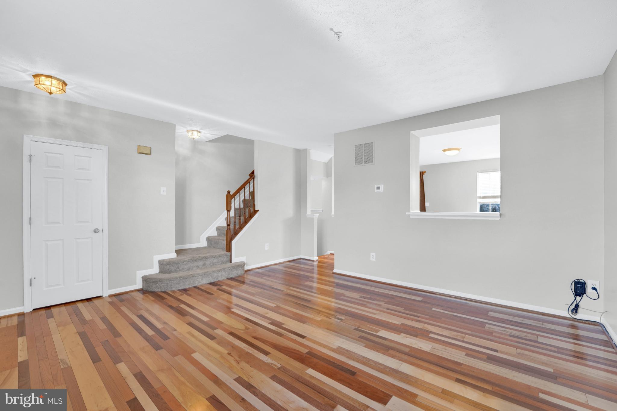 265 Cherry Tree Square Forest Hill, MD 21050 - Photo 3 of 29 Spacious living area with elegant hardwood floors.
