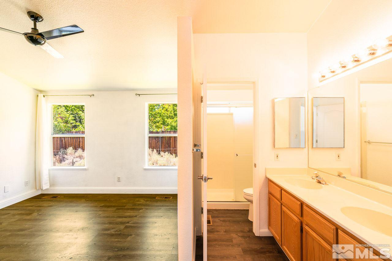 6542 Fall River Circle Reno, NV 89523 - Photo 11 of 17 a view of a kitchen with a sink and wooden floor