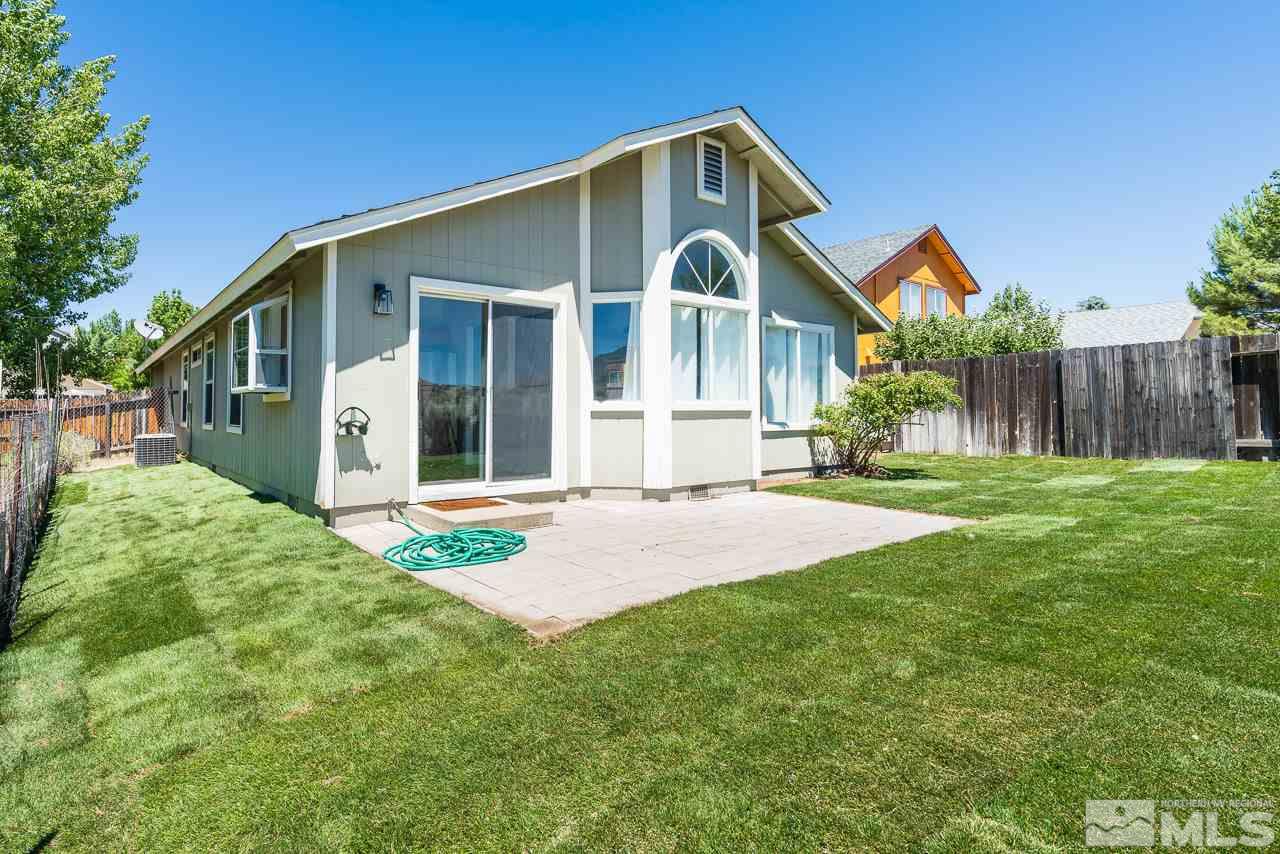 6542 Fall River Circle Reno, NV 89523 - Photo 15 of 17 a front view of house with yard and green space