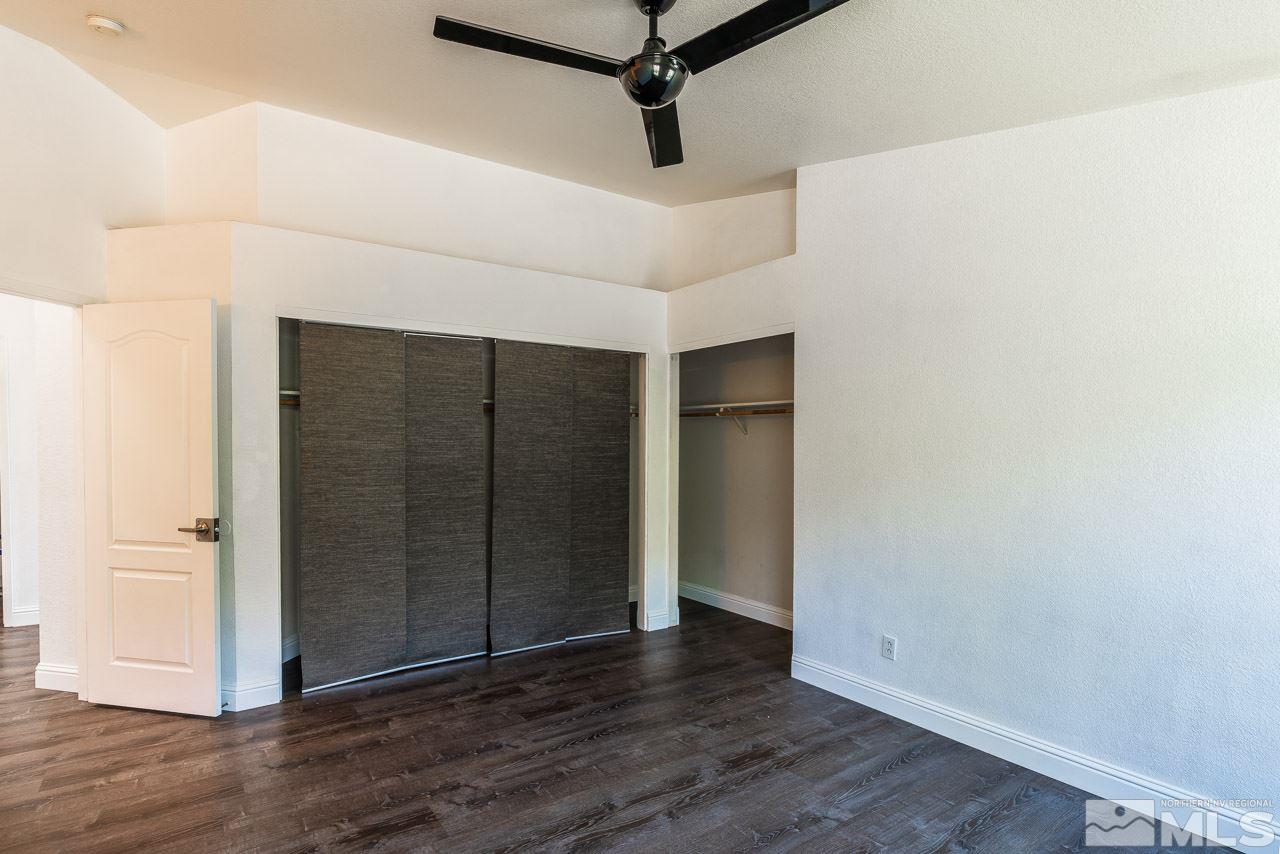 6542 Fall River Circle Reno, NV 89523 - Photo 9 of 17 a view of a hallway with wooden floor
