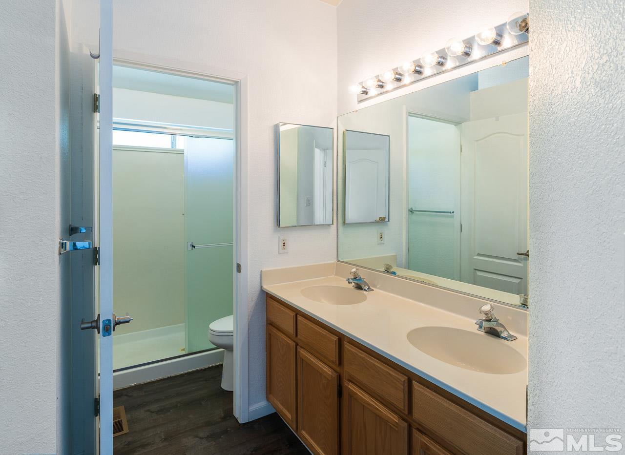 6542 Fall River Circle Reno, NV 89523 - Photo 10 of 17 a bathroom with a sink and a mirror