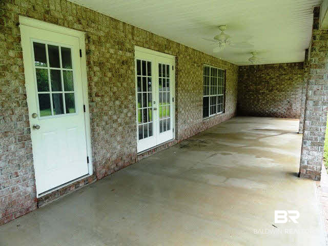 27927 Rileywood Drive Daphne, AL 36526 - Photo 21 of 24 Covered Back Porch is 40 x 10