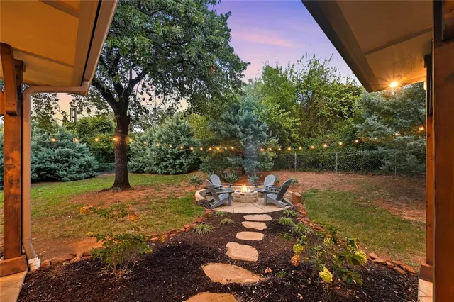 a backyard of a house with lots of green space