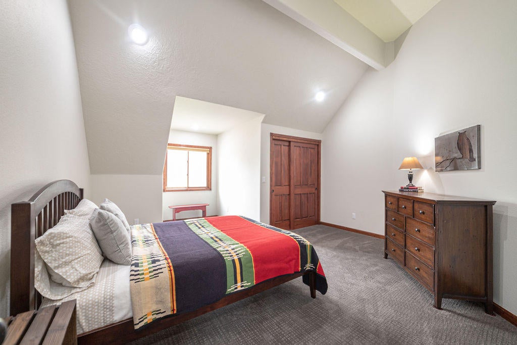 60675 Billadeau Road Bend, OR 97702 - Photo 38 of 87 There are also 2 guest bedrooms with vaulted ceilings.