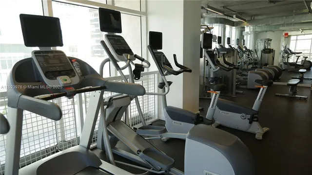 a view of a building along with potted plants