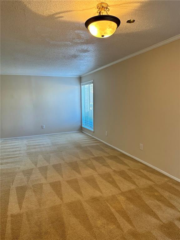 3301 Henderson Mill Road, Unit E7 Atlanta, GA 30341 - Photo 3 of 8 a view of an empty room with a window