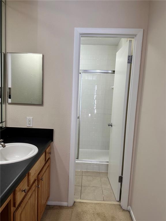 3301 Henderson Mill Road, Unit E7 Atlanta, GA 30341 - Photo 6 of 8 a bathroom with a sink and a mirror