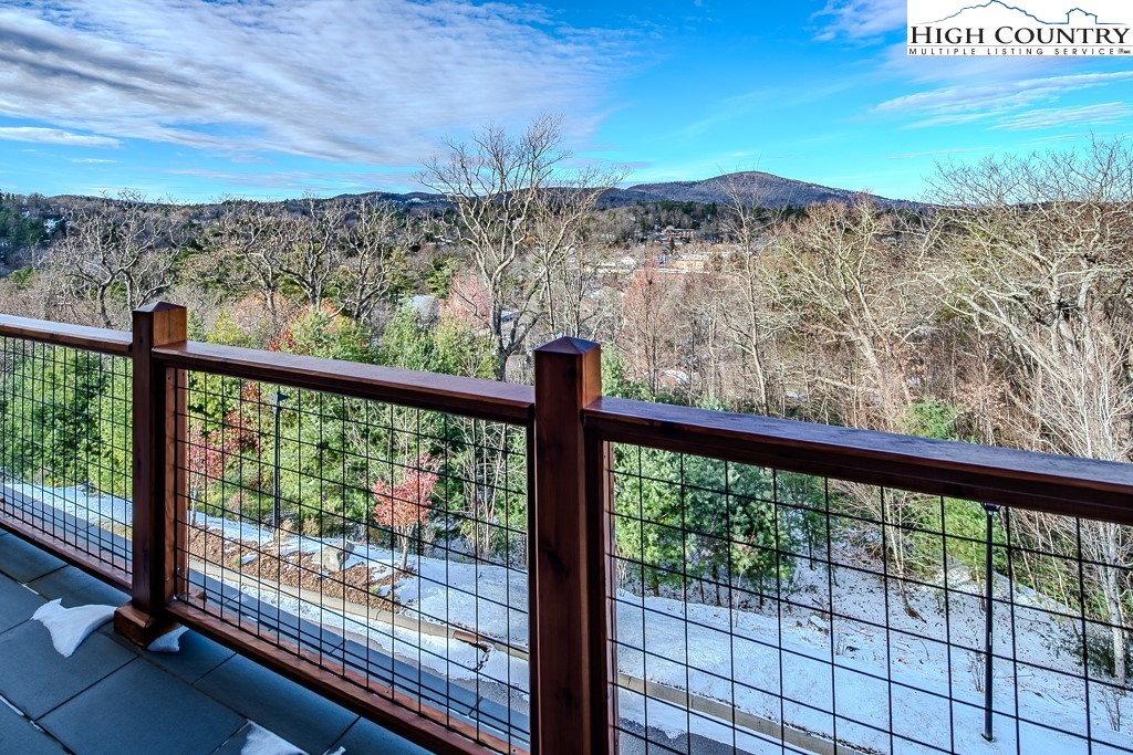 215 Cone Vista Circle, Unit B Blowing Rock, NC 28605 - Photo 15 of 50 a view of a balcony with an ocean view