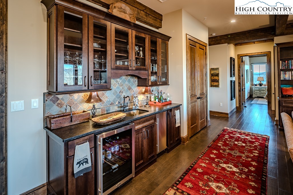 215 Cone Vista Circle, Unit B Blowing Rock, NC 28605 - Photo 31 of 50 a hallway with furniture and rug
