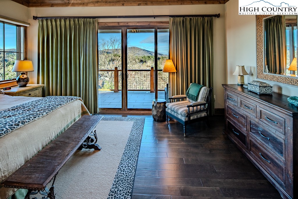 215 Cone Vista Circle, Unit B Blowing Rock, NC 28605 - Photo 36 of 50 a living room with furniture and a large window