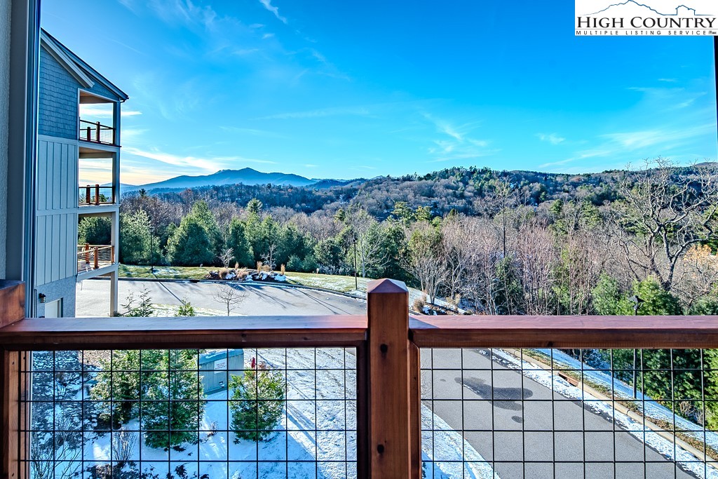 215 Cone Vista Circle, Unit B Blowing Rock, NC 28605 - Photo 38 of 50 a view of a balcony with lake view and mountain view