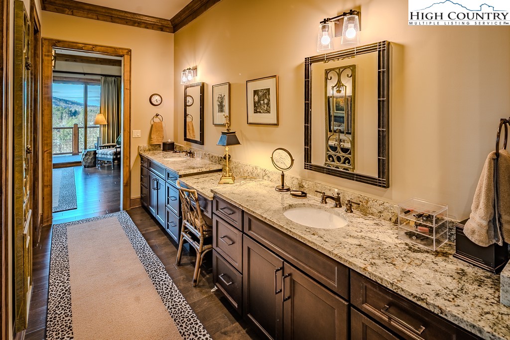 215 Cone Vista Circle, Unit B Blowing Rock, NC 28605 - Photo 41 of 50 a bathroom with a sink and a mirror