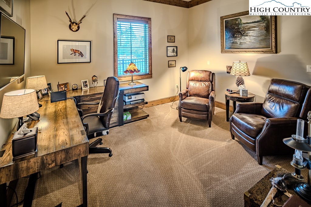 215 Cone Vista Circle, Unit B Blowing Rock, NC 28605 - Photo 43 of 50 a living room with furniture a couch and a window