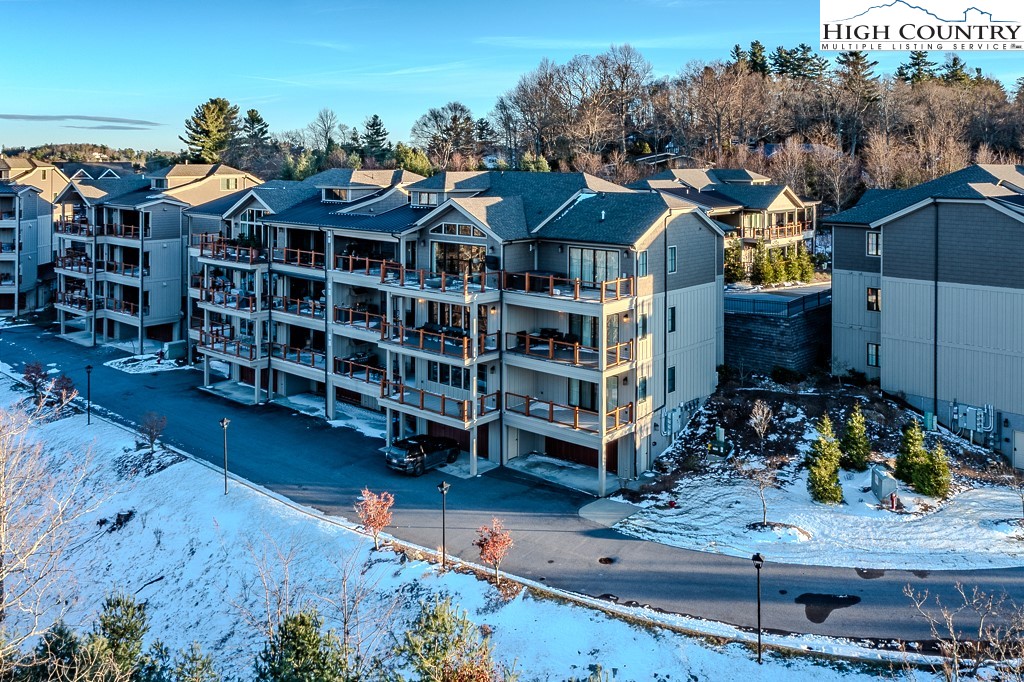 215 Cone Vista Circle, Unit B Blowing Rock, NC 28605 - Photo 49 of 50 a view of a street with potted plants