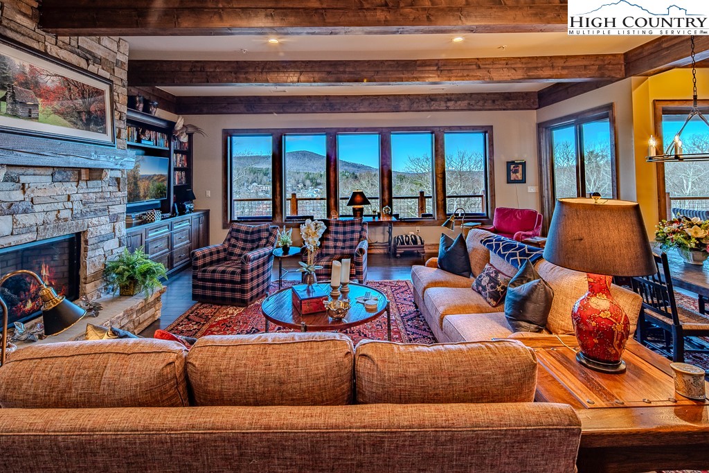 215 Cone Vista Circle, Unit B Blowing Rock, NC 28605 - Photo 6 of 50 a living room with furniture and a fireplace