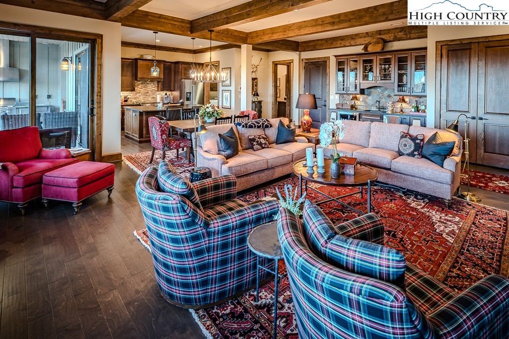 215 Cone Vista Circle, Unit B Blowing Rock, NC 28605 - Photo 9 of 50 a outdoor space with patio the couches and a potted plant