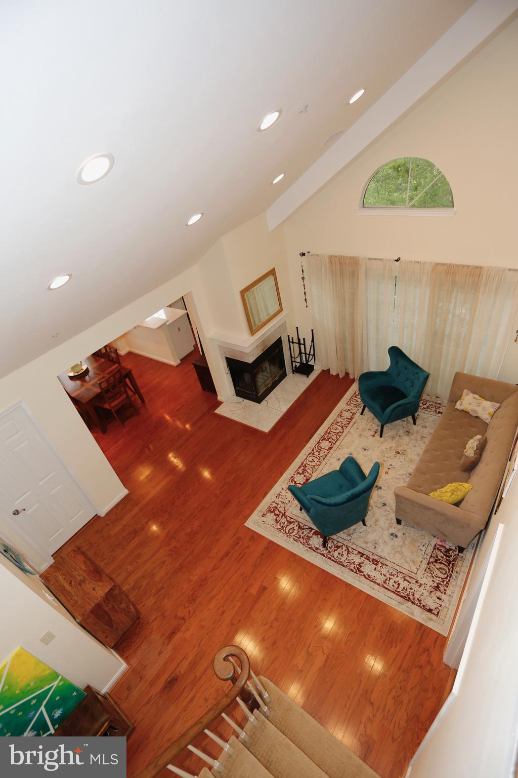 415 Ridgepoint Place, Unit 32 Gaithersburg, MD 20878 - Photo 18 of 24 View of main level living room from upper level