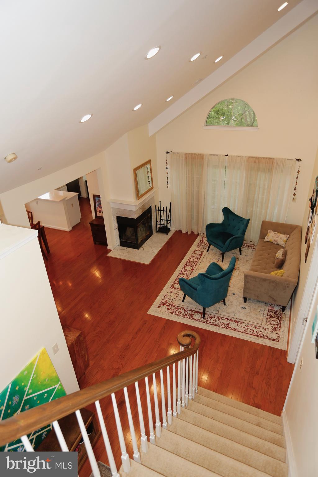 415 Ridgepoint Place, Unit 32 Gaithersburg, MD 20878 - Photo 20 of 24 View of mail level living room from upper level