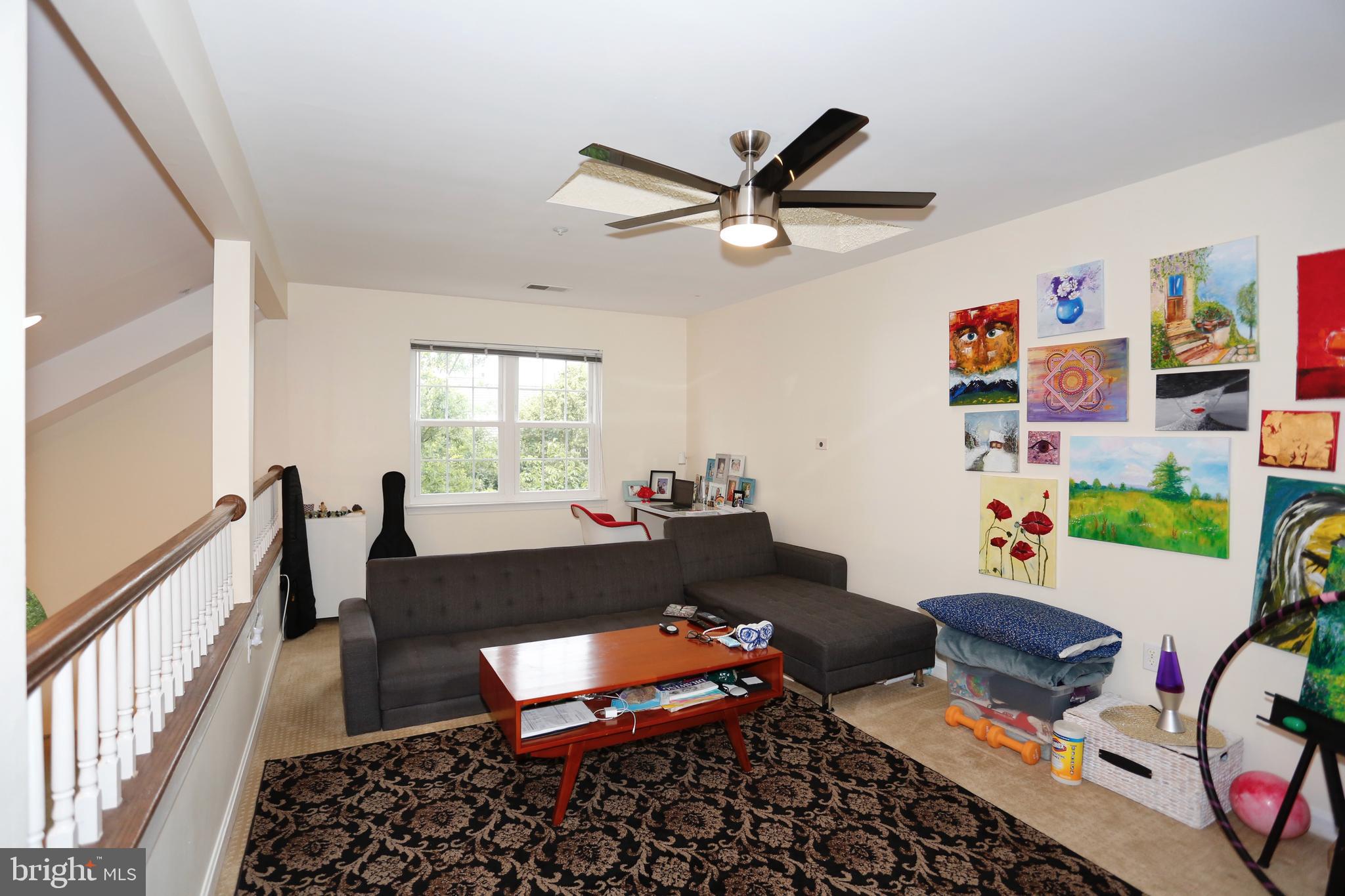 415 Ridgepoint Place, Unit 32 Gaithersburg, MD 20878 - Photo 21 of 24 Upper level rec room/family room