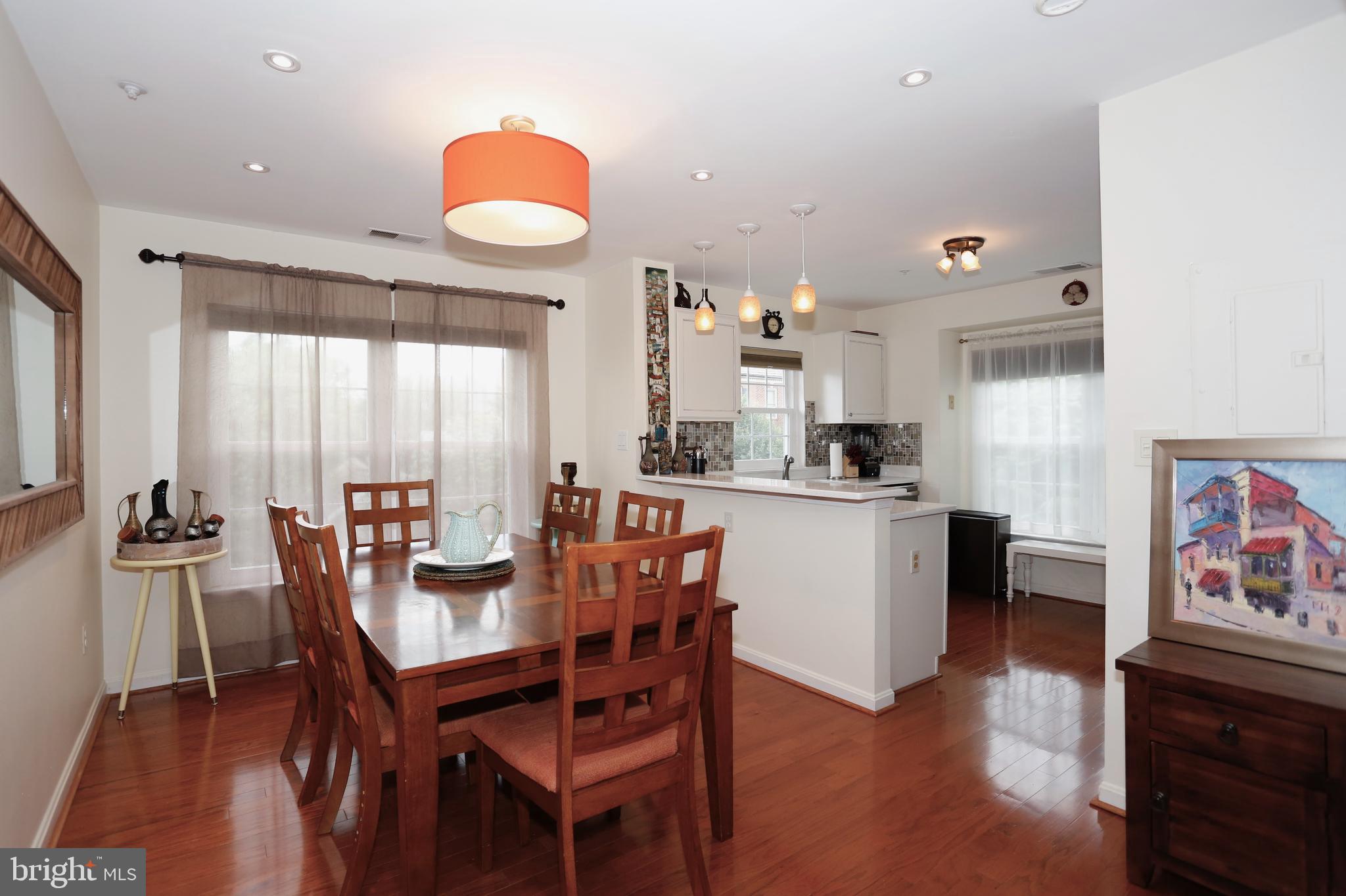 415 Ridgepoint Place, Unit 32 Gaithersburg, MD 20878 - Photo 5 of 24 Dining room connects to kitchen