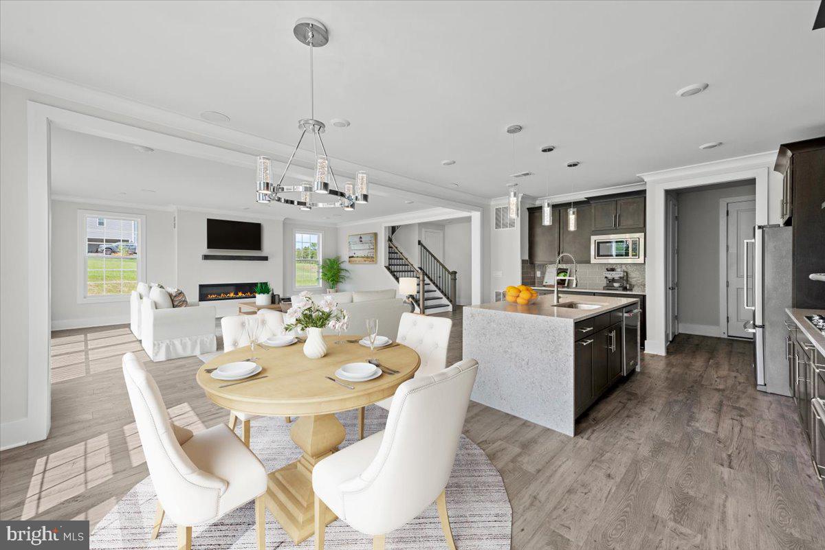 3900 Logmill Road Gainesville, VA 20155 - Photo 11 of 47 Virtual Staged to show space for table