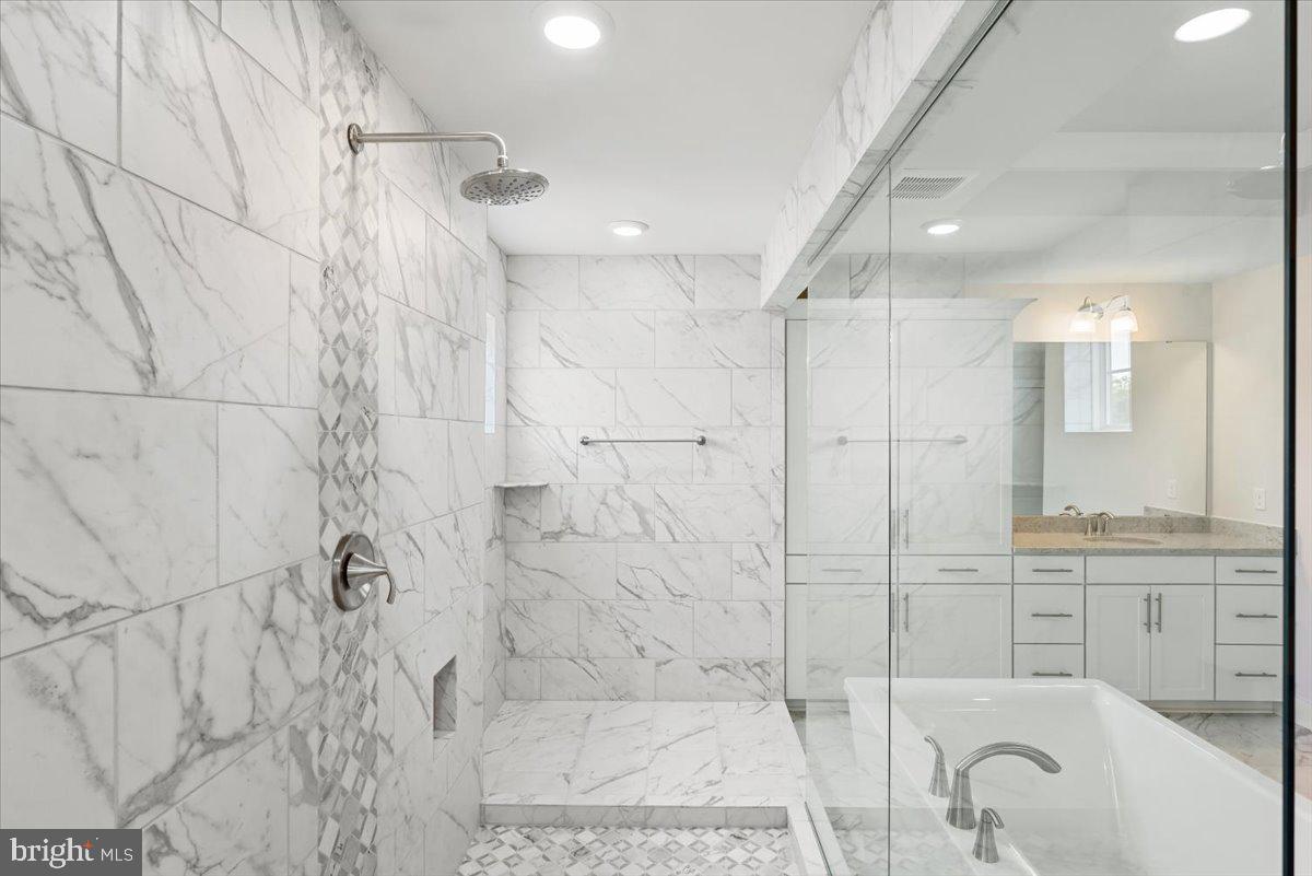 3900 Logmill Road Gainesville, VA 20155 - Photo 18 of 47 Separate, marble, shower with a rain shower-head