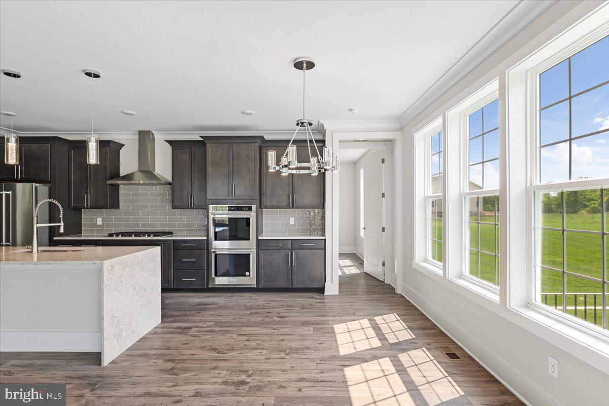 3900 Logmill Road Gainesville, VA 20155 - Photo 8 of 47 Main level bedroom door, off of kitchen