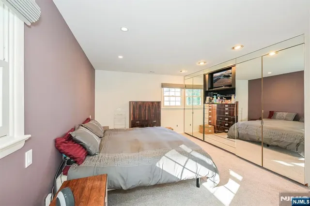 a kitchen with granite countertop wooden cabinets and a sink