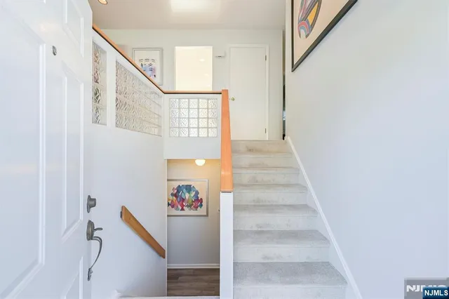 a view of a living room and dining room