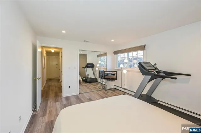 a view of a yard with a large tree