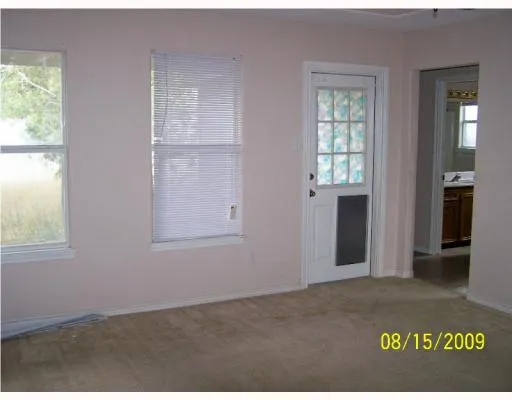 an empty room with windows