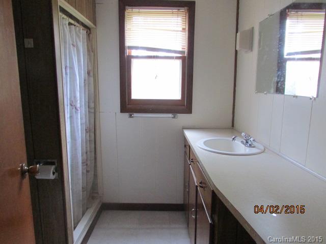 3839 Banoak Road Vale, NC 28168 - Photo 12 of 17 a bathroom with a sink and a window