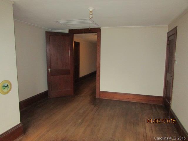 3839 Banoak Road Vale, NC 28168 - Photo 9 of 17 an empty room with wooden floor and closet