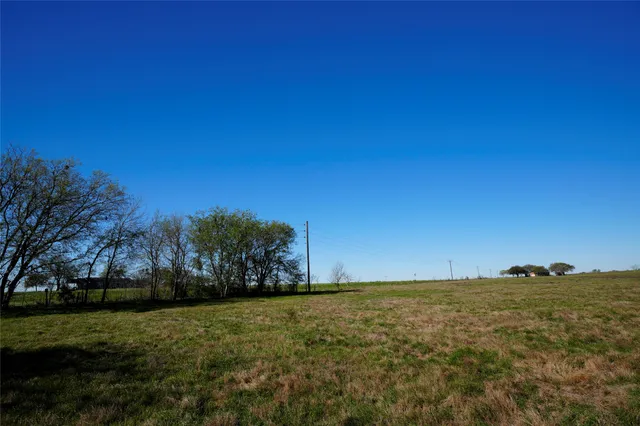 a view of an ocean and a mountain