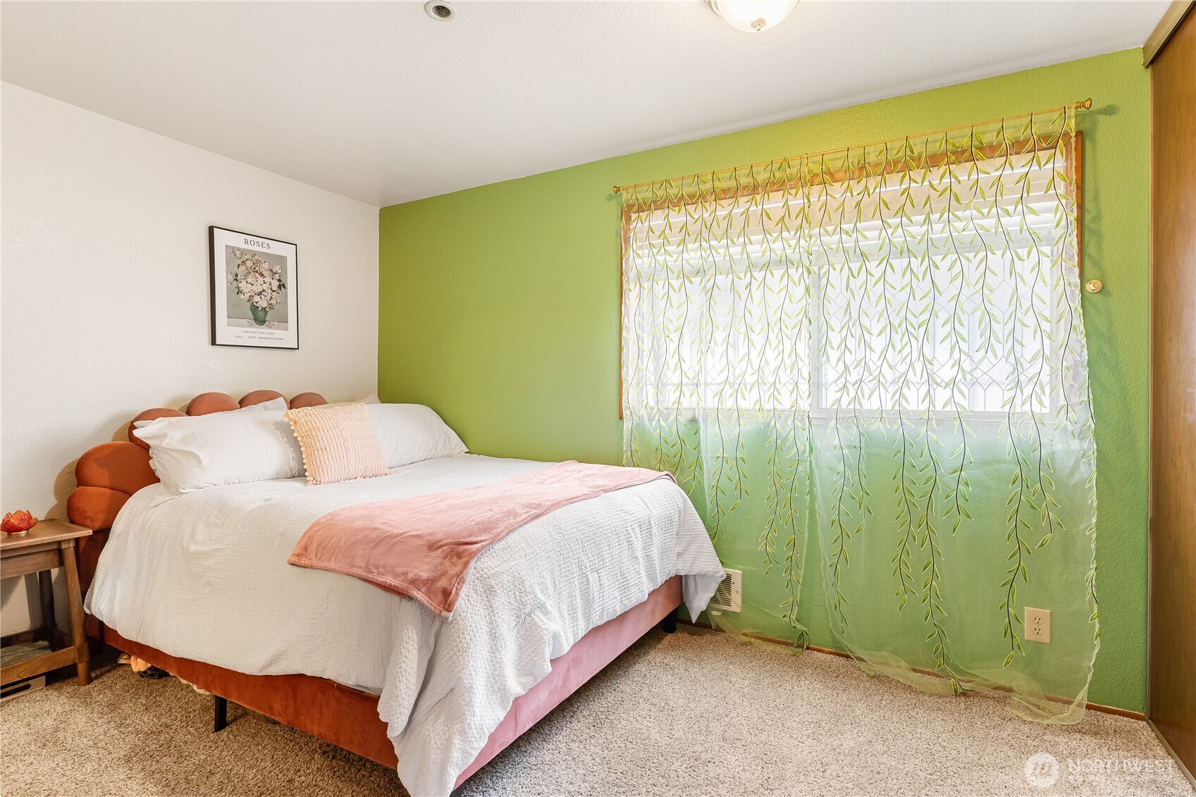 2619 Rucker Avenue, Unit 2 Everett, WA 98201 - Photo 24 of 33 a bedroom with a bed and a window