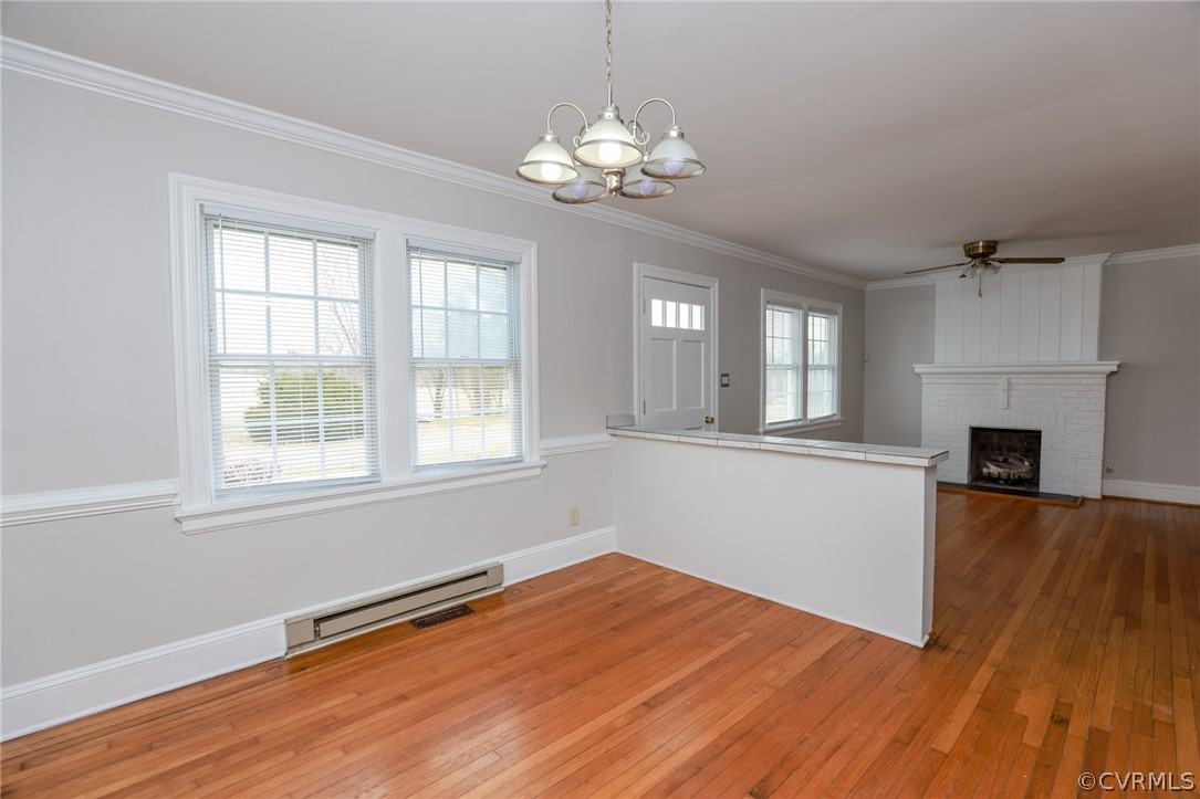 1737 New Market Road Henrico, VA 23231 - Photo 8 of 50 Dining room/ living room with FP