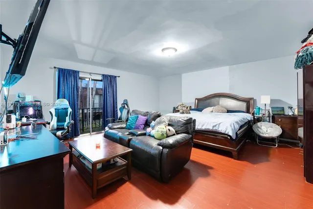 a bedroom with furniture and a couch