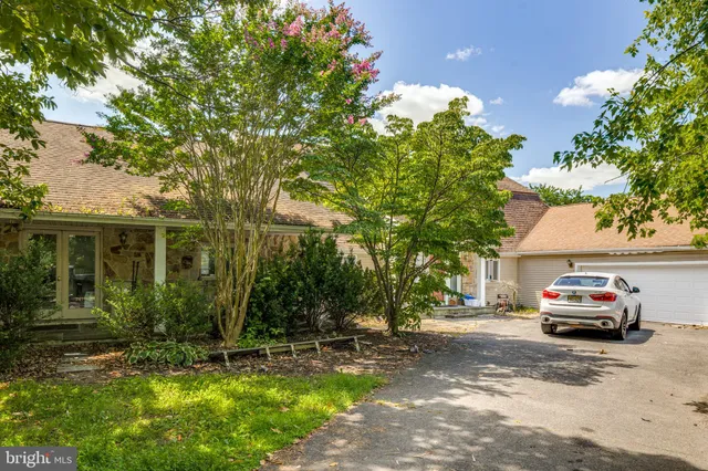 a car parked in front of a house