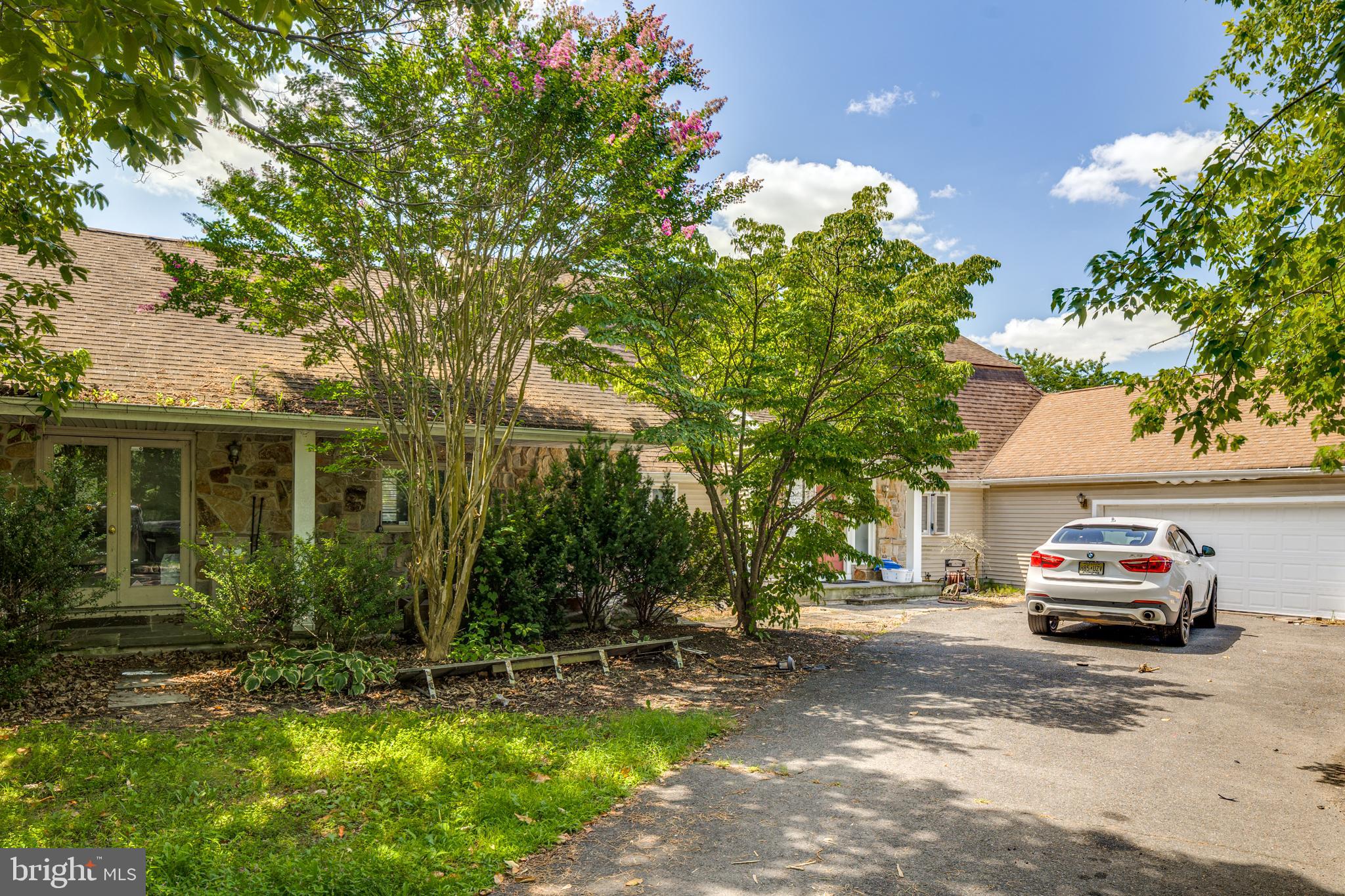a car parked in front of a house